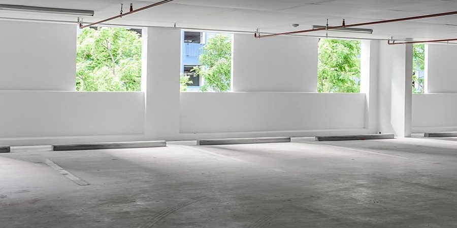 This image shows a concrete-coated floor in a commercial space.