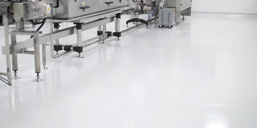 This image shows an industrial plant with new epoxy floor paint.