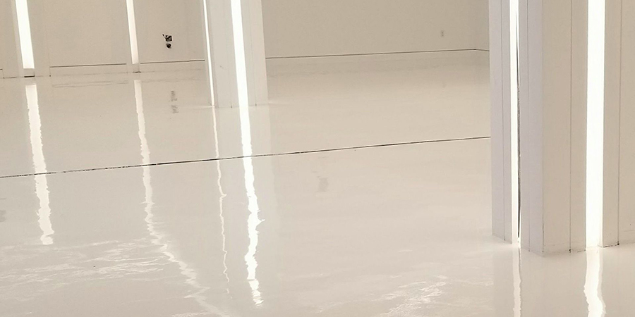 This image shows a room with a white epoxy floor.
