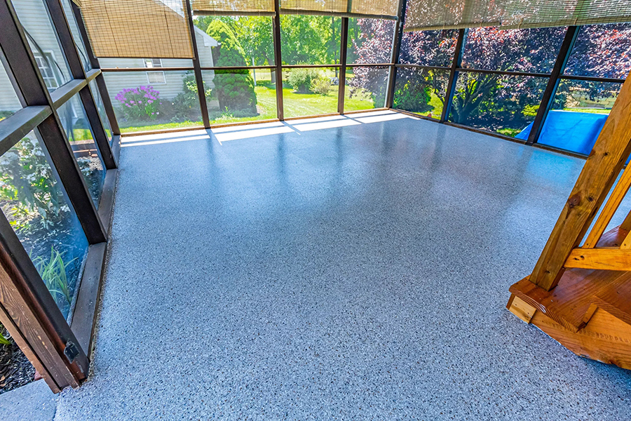 This image shows a part of a house with flake epoxy flooring.